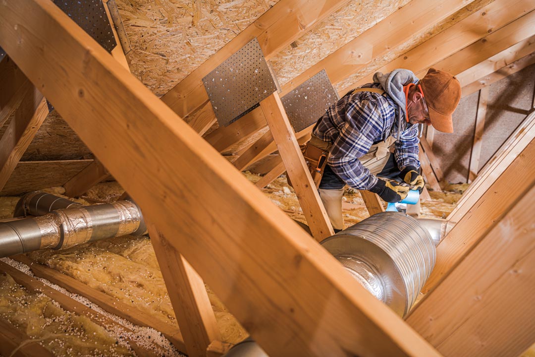 hvac-technician-installing-air-duct-filter-2025-03-15-02-50-55-utc